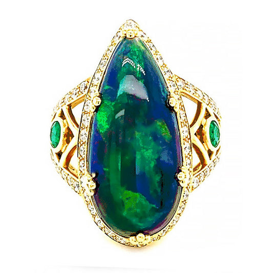 18 kt yellow gold ring with Ethiopian Opal, Diamonds and emeralds